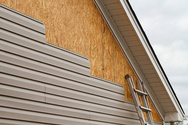 Professional Siding Installation technician working in Middletown, NY